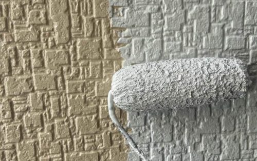 外壁塗装上塗り1回目施工中