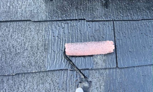 屋根塗装　下塗り２回目施工中